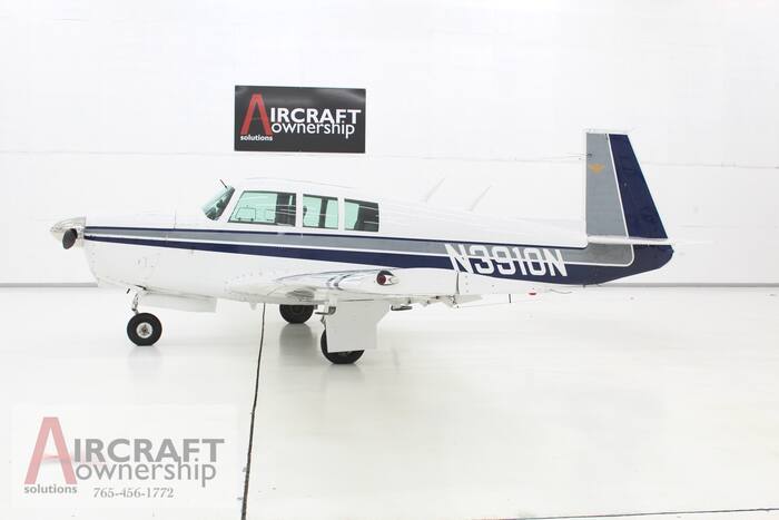 N3910N left side profile in the hangar